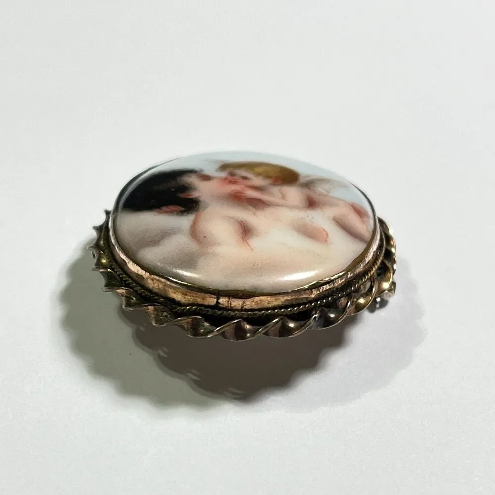 VTG Porcelain Brooch Cupid Kiss Portrait Art Gold Tone Bezel Frame Pin Ceramic